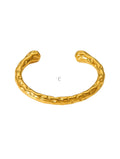 Gold Cuff by Gina Carmen